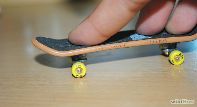Image titled 1080 Tailgrab on a Tech Deck Step 4