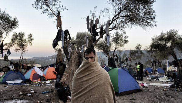 Мигрант на острове Лесбос, Греция