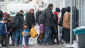 Беженцы в очереди на регистрацию в Пассау, Германия. 16 января 2016