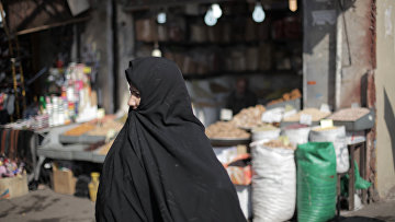 Женщина на рынке в Тегеране. Иран.