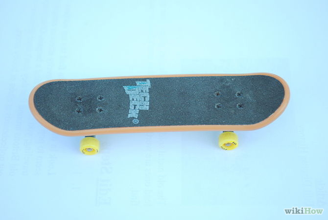 Image titled 360 Flip on a Tech Deck Step 1