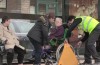 Parking attendant gives woman in wheelchair wheel clamp