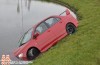 Auw: Mitsubishi Evo VIII does a bit of paddling in Maasdijk