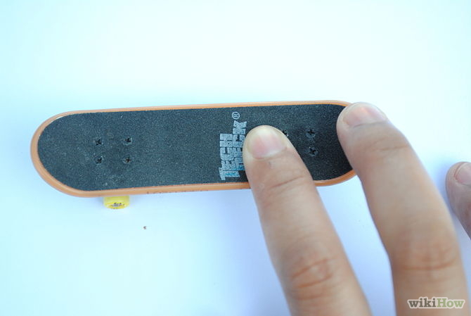 Image titled 360 Flip on a Tech Deck Step 2