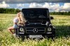 Mercedes G63 AMG vs. babe: one of them is already 36, but who?
