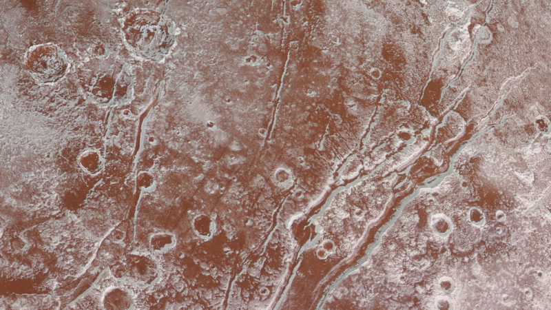 NASA’s New Photos Bring Pluto’s Surface Into Sharp Focus