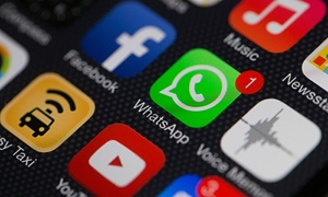 WhatsApp on a phone homescreen.
