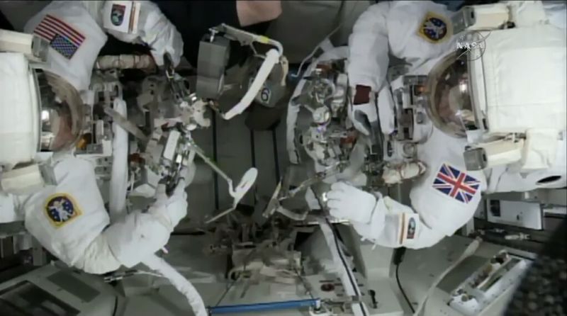 Watch as Astronauts Scramble Around Outside the Space Station [LIVE]