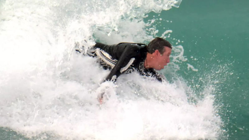 The Foam Fins Covering This Wetsuit Let You Body Surf Without a Board
