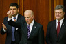 U.S. Vice President Joe Biden (C) greets deputies as Ukraine's President Petro Poroshenko (R) and Parliament Speaker Volodymyr Groysman stand behind at the parliament in Kiev, Ukraine, December 8, 2015. REUTERS/Valentyn Ogirenko - RTX1XPHT