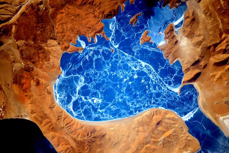 Sink Into the Beauty of This Frozen Mountain Lake