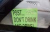 Drunken speed demon pulls a beer open after arrest