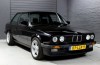 Buy: BMW E30 with M5 block pulls tiles from the sidewalk