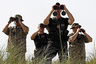 U.S. Secret Service provide security for President Barack Obama in Pensacola, Florida, June 15, 2010. Obama is in the region to get an update on the BP oil spill.     REUTERS/Jim Young    (UNITED STATES - Tags: POLITICS) - RTR2F7S6
