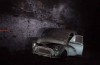 Collapsed railway tunnel filled with old cars