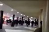 Masked group of young immigrants to