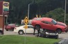 Chevrolet Camaro crashes on top of Subaru