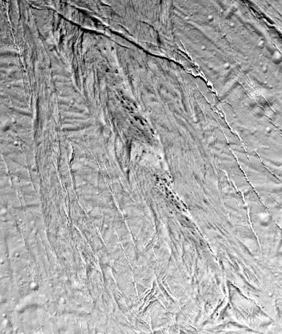 We Still Don't Understand These Spots on Saturn's Moon, and We're Not Going Back