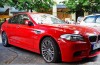 Spotted: red BMW M5 sedan