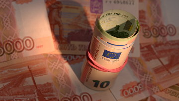 Денежные купюры России и Европейского Союза. Архивное фото