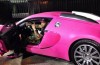 Flo Rida rides a pink Bugatti Veyron. Is proud