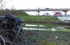 SUV flies over 10 meters wide river in Heteren