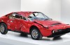 Art: crashed Ferrari sold for $250,000 in