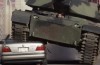 Video: Dan Bilzerian walst with a tank over a BMW 7 Series