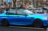 Matblauwe BMW M5 and crack your screen on