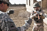 Jan. 8, 2015 - Baghdad, Iraq - American military training with Iraqi soldiers during an exercise on approaching and clearing buildings in Baghdad, on January 8, 2015. The US Military begin 6 month programs teaching the Iraqi National Army how to conduct operations against ISIS over the coming years in Iraq. (Credit Image: © Jacob Simkin/NurPhoto/ZUMA Wire)