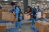 Panasonic zeigte робокостюмы für schwere Berufe