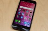 The ASUS ZenFone Zoom camera-phone in the hands of the photographer